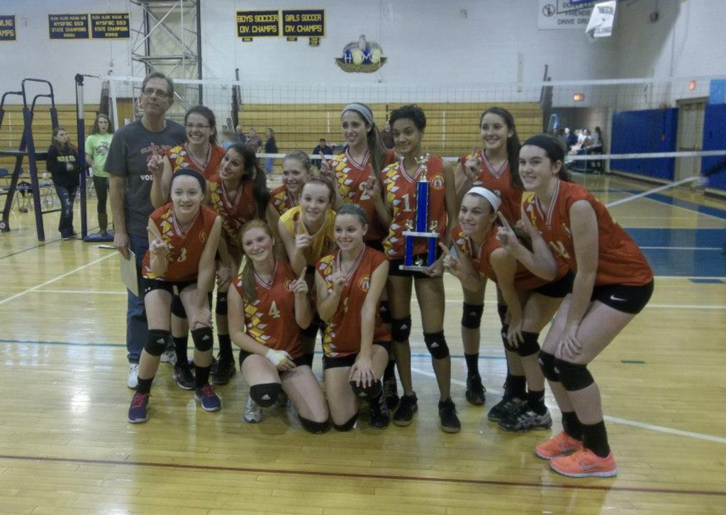 Gabby Huff and her JV volleyball team winning a tournament