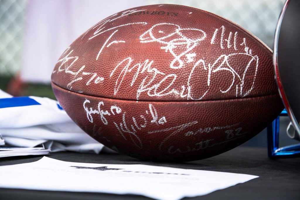 Football with 10+ autographs